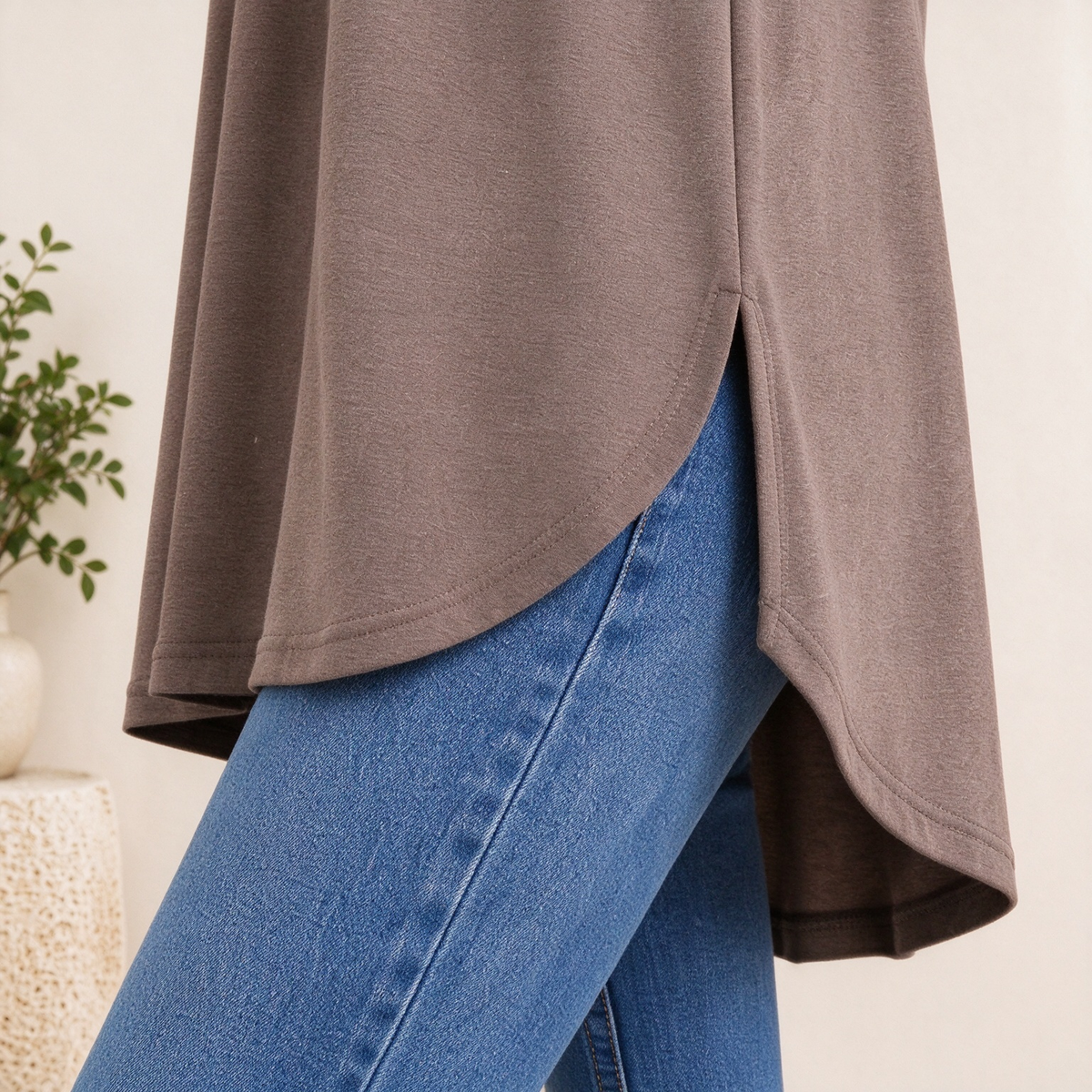 Curved high-low hem detail